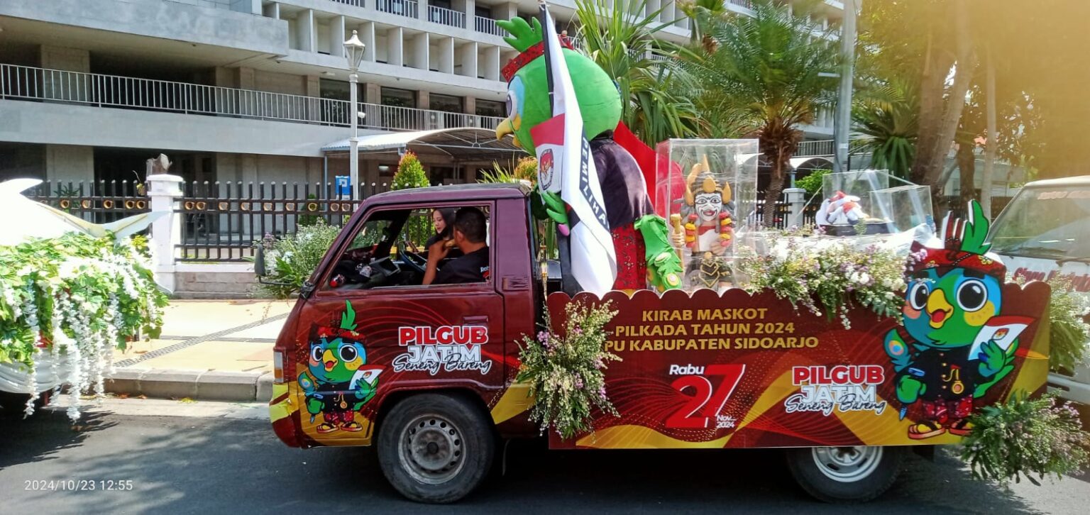 Semarak Pawai Maskot Pilkada 2024, KPU Sidoarjo Kirab Guk KASIJO Mendampingi Si-JALIH KPU Kabupaten Sidoarjo menggelar kirab maskot Guk KASIJO bersama Si – JALIH berangkat dari kantor di Jl. Cemengkalang Sidoarjo menuju Surabaya untuk diserahkan ke KPU Jatim.